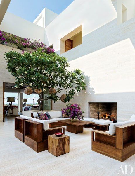 On Mexico’s Baja peninsula, Cindy Crawford and Rande Gerber and close friend George Clooney built neighboring beachside retreats. The outdoor fireplace in Crawford and Gerber’s courtyard is surrounded by custom teak furniture. Mexican Beach House, Mexican Villa, Real Estat, Have Inspiration, Patio Interior, Design Exterior, George Clooney, Cindy Crawford, Celebrity Houses