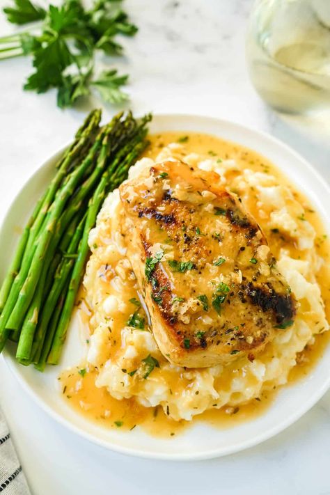 This Chicken with White Wine Sauce contains no cream and is the perfect light dinner. Tender chicken breasts are cooked in a light, delicious garlicky white wine pan sauce with just a hint of lemon and fresh herbs. It's restaurant quality meal in under 30 minutes! Get On My Plate, Lemon Chicken And Mashed Potatoes, Marry Me Chicken Mashed Potatoes, Marry Me Chicken Over Mashed Potatoes, Creamy Chicken Mashed Potatoes, Creamy Chicken And Mashed Potatoes Recipes, Cream Chicken And Mashed Potatoes, Chicken With Mashed Potatoes Recipes, Marry Me Chicken With Mashed Potatoes