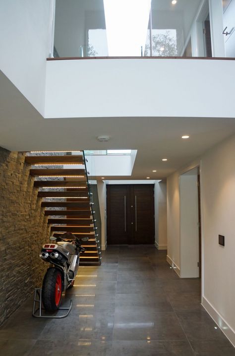 Nairn Road Residence by David James Architects (7) Motorcycle Parking Design, Parking Design Plan, Under Staircase, Motorcycle Parking, Timber Staircase, Floating Staircase, Stylish Interior Design, David James, Casa Container