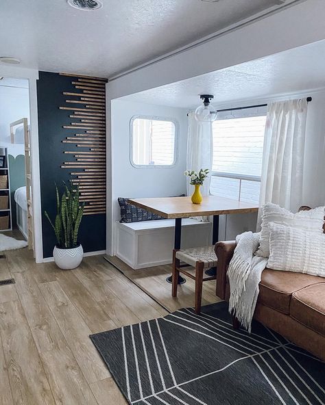 See how a couple renovated a Keystone Springdale Travel Trailer for their family of 5 Boho Travel Trailer, Decorating Your Rv, Rv Interior Design, Space Saving Ideas, Rv Interior Remodel, Camper Interior Design, Camper Trailer Remodel, Boho Travel, Diy Camper Remodel