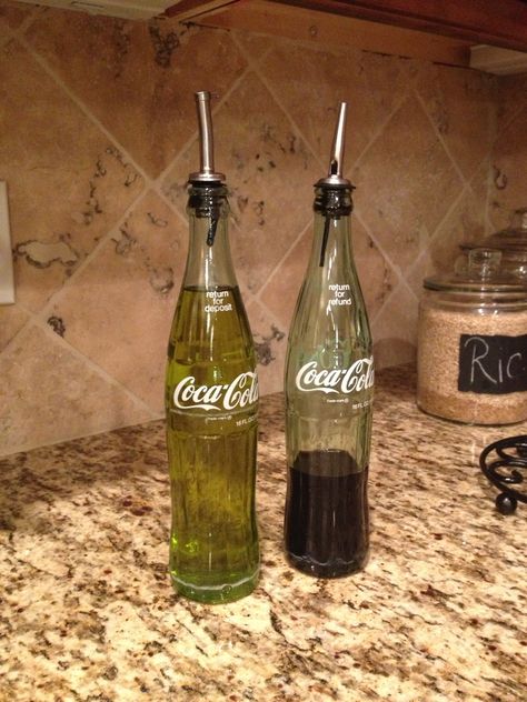 Antique coke bottles used for oil and vinegar dispensers, great idea mom! Bottle Repurpose Ideas, Glass Soda Bottle Crafts, Glass Coke Bottle Crafts, Coke Bottle Crafts, Soda Bottle Crafts, Oil And Vinegar Dispensers, Coca Cola Decor, Bottle Ideas, Coke Bottle