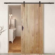 Thruslide Traditional Solid Rustic Oak Button Bead Ledged Sliding Door - Lifestyle Image. #barn #style #door Oak Sliding Doors Internal, Barn Doors Internal, Sliding Oak Doors Internal, Rustic Sliding Doors Interior, Interior Wooden Barn Doors, Traditional Sliding Door, Oak Sliding Door, Barn Door For Kitchen, Rustic Sliding Barn Door