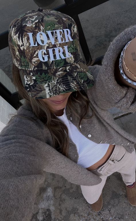 Preorder tees and sweatshirts ship out within 2-12 business days and preorder hats can take up to 15 business days to ship.   Camo is the new pink! Rock this trendy camo trucker hat this Valentine's Day - we can guarantee your guy will think it's the coolest.   ALL HATS ARE FINAL SALE! Camo Hats Outfits, Trucker Hat Outfit, Girl Valentines, Girl Trucker, Camo Trucker Hat, Custom Trucker Hats, Lover Girl, Camo Girl, Cowgirl Outfits