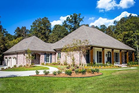 Architectural Designs on Instagram: “Our client built House Plan 56408SM with the dormers removed on their property in Louisiana. Great job by Starkey Builders, LLC.⁠…” Acadian Style Homes Exterior, Acadian Style Homes Louisiana, French Acadian Style Homes, Acadian Style Homes, Acadian Homes, French House Plans, Brick House Plans, Acadian House Plans, Planning For The Future