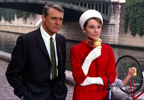 Audrey Hepburn and Cary Grant along the Seine River while shooting Charade Charade Movie, Audrey Hepburn Charade, Charade 1963, Audrey Hepburn Outfit, Audrey Hepburn Movies, Blake Edwards, Alfred Hitchcock Movies, Mystery Film, Buster Keaton