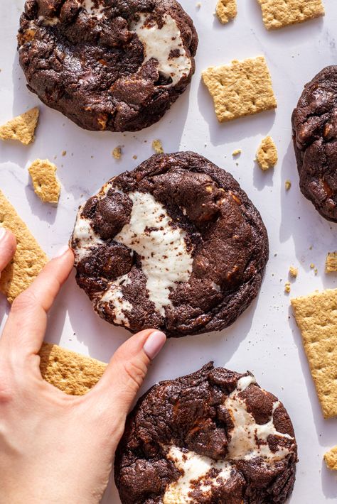 Gooey marshmallow center, chunks of graham cracker, melted chocolate, and a chewy double chocolate cookie, creates the perfect s’mores cookies every time. Double Chocolate Smores Cookies, Chocolate Smores Cookies, Campfire Cookies, Thanksgiving Favorites, Smores Cookie, S Mores Cookies, Graham Cracker Cookies, Chewy Chocolate Cookies, Cracker Cookies