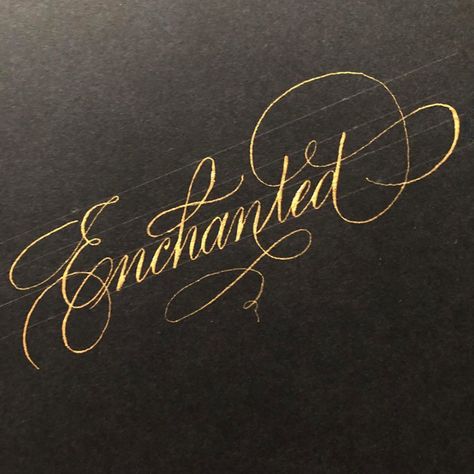 @winterrosecalligraphy • ✨Enchanted✨Word of the day for @inktober written in Copperplate Calligraphy using Dr. PH Martins Copperplate Gold metallic ink.  . I learned so much at @logos_calligraphy workshops last week. It really helped to improve my flourishing and formation of my Cooperplate letters. 🤩 . #inktober #inktober2019 #winterrosecalligraphy #copperplatecalligraphy #copperplate #dippencalligraphy #pointedpencalligraphy #pointedpen #dippen #blackandgold #goldink #leonardtprincipal #nib # Moon On Water, Calligraphy B, Calligraphy Art Ideas, Letters Background, Flourishing Calligraphy, Calligraphy Flourishing, Pointed Pen Calligraphy, Calligraphy Workshop, Alphabet Style