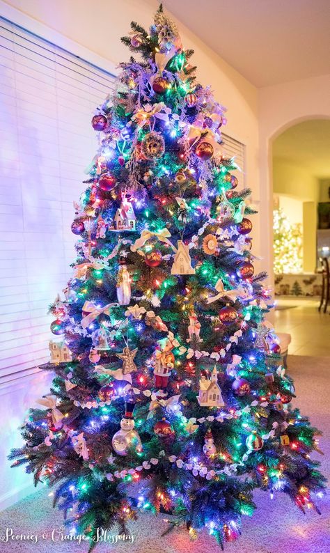 Classic Vintage Christmas tree with colored lights Trees With Colored Lights, Christmas Trees With Colored Lights, Christmas Tree Ideas Colorful Lights, Multi Colored Light Christmas Tree Ideas, Colored Light Christmas Tree Ideas, Tree With Colored Lights, Christmas Tree Colored Lights, Christmas Tree With Coloured Lights, Colored Lights