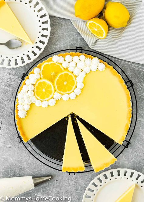 This Eggless Lemon Tart is fresh, zingy, creamy, and super easy to make! The perfect addition to your party or really any occasion. @mommyhomecookin #recipe #eggless #eggfree #lemon #tart #dessert Lemon Custard Pie, Allergy Friendly Desserts, Lemon Curd Tart, Lemon Tart Recipe, Homemade Graham Cracker Crust, Homemade Graham Crackers, Lemon Custard, Tart Filling, Eggless Recipes