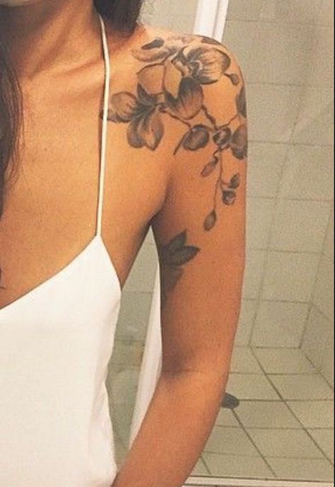 220+ Unparalleled Orchid Tattoo Designs With Meanings (2023) - TattoosBoyGirl Orchid Tattoo Shoulder For Women, Orchid Flower Tattoos Shoulder, Orchid Tattoo Back For Women, Shoulder Orchid Tattoo, Orchid Tattoo Placement, Orchid Shoulder Tattoos For Women, Orchid Sleeve Tattoo, Orchid Arm Tattoo, Shoulder Tattoo Ideas Unique