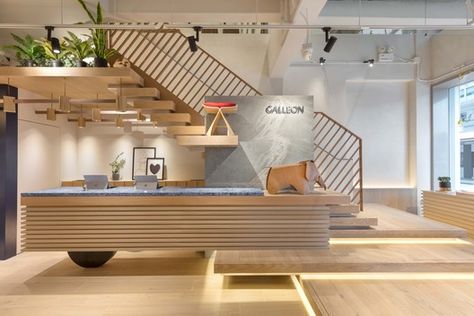 Galleon / Studio Adjective | Netfloor USA Reception Stairs, Cafe Stairs, Reception Counter Design, Balinese Architecture, Stage Floor, Massage Room Design, Reception Desk Design, Pharmacy Design, Fashion Walk