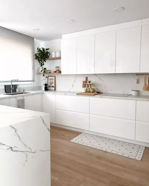 21+ Cleanest All-White Kitchen Design Inspirations For 2024 - DrExplains White Kitchen Handleless, White Modern Cabinets Kitchen, White Kitchen No Handles, Modern Kitchen Design White Cabinets, White Kitchen Update, Bright White Kitchen Ideas, Kitchens With White Countertops, L Shaped White Kitchen, Minimalist Kitchen Design Inspiration