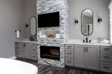 A designer transforms a Pennsylvania couple’s cramped and dated master bath into an airy retreat with relaxing amenities Tv In Bathroom Ideas, Bath With Tv, Matte Black Shower Fixtures, Small Shower Stalls, Tv And Fireplace, Tv In Bathroom, Narrow Bathroom, Bathroom Fireplace, Primary Bathroom