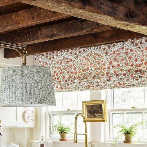 OLIVER JAMES INTERIORS on Instagram: "Can’t stop, won’t stop, loving this sweet kitchen. 💌  The rustic wooden ceiling beams and sage green cabinets with brass hardware create the coziest, most inviting space. And the floral Roman shade? Chef's kiss.   Save this for your kitchen inspiration! ✨ 📸: @joyellewest" Floral Roman Shades, Cabinets With Brass Hardware, Wooden Ceiling Beams, Sage Green Cabinets, Roman Shades Kitchen, Oliver James, Wooden Beams Ceiling, Sweet Kitchen, Wooden Ceiling