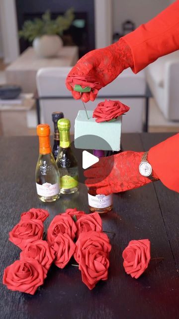 Nadine Ness on Instagram: "Valentine’s DIY Gift Package Idea  Over the weekend I went to @walmart and find these cute mini @stellarosa wine bottle and I knew they were perfect for this DIY.   Which option you like the most? Option 1 or 2?  #DIY #diycrafts #diyhome #floralarrangement #valentine #giftideas" Diy Wine Box Ideas, Wine Bottle Bouquet Ideas, Tumbler Basket Ideas, Gift Basket Ideas With Alcohol, Bottle Bouquet Diy Gift Ideas, Wine Bottle Bouquet Gift, Wine Bouquet Gift Diy, Candy And Flower Bouquet, Mini Wine Bottles Gifts