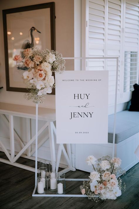 Love the 2 small floral clusters adorning this welcome sign and the candles add the glamoiur when lit! Photography📸 Single Soul Wedding Welcome Sign Easel, Welcome Sign Florals, Bramleigh Estate, Venue Entrance, Wedding Welcome Signage, Engagement Photo Shoot Poses, Village Aesthetic, Wedding Entrance Sign, Reception Signage