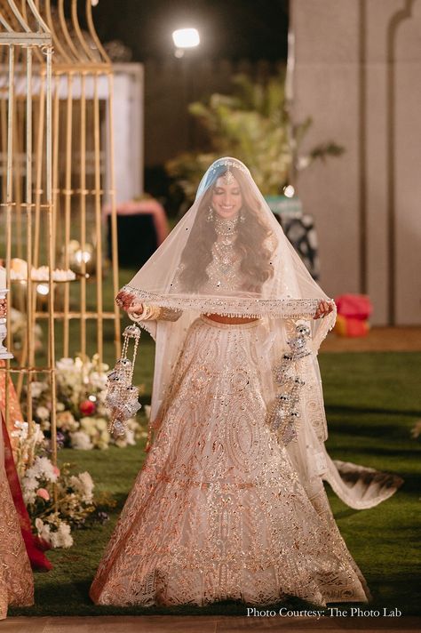 bride, ivory wedding lehenga, veil, bridal beauty, wedding glamour, ethereal elegance, wedding fashion, bridal inspiration, Indian wedding trends, stunning bride, wedding day, regal bride, ivory elegance, wedding attire, enchanting bride, bridal look bridal veil longs veils grace indian wedding indian bride wedding bride wedding sutra traditional fashion, bridal veil fashion, bridal fashion, veils, traditional veils white lehenga traditional look bridal white lehenga Lehenga Veil Indian Bridal, Bridal Veil Indian, Indian Wedding Veil, Poolside Wedding Ceremony, Regal Bride, Lehenga Traditional, Veil Fashion, Fairmont Jaipur, Ivory Lehenga