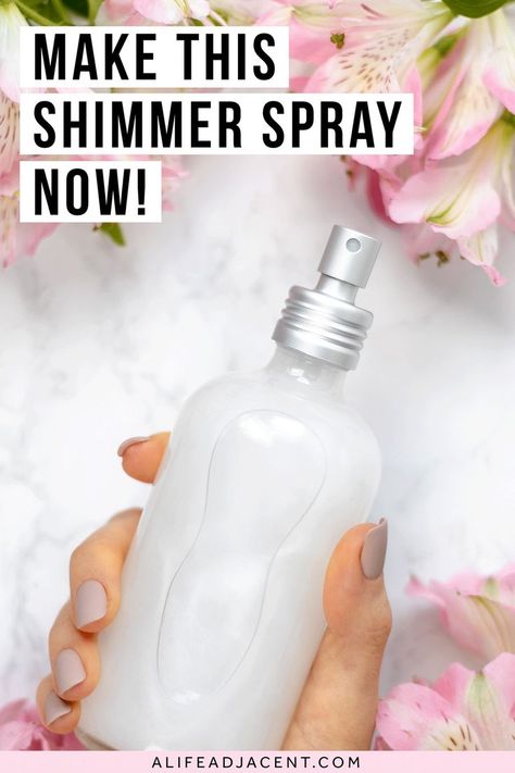 Woman's hand holding bottle of DIY shimmer spray in a glass spray bottle with a silver nozzle. Text overlay: Make this shimmer spray now! How To Make Shimmer Spray, Diy Glitter Hair Spray, Shimmer Spray Diy, Shimmer Potion Diy, Diy Body Spray With Fragrance Oil, Diy Feminine Spray, Diy Body Shimmer Spray, Diy Glitter Spray, Body Shimmer Glowing Skin