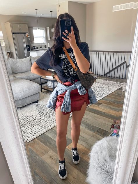 Mini Skirts With Sneakers, Tshirt Outfit With Sneakers, Sneakers With Mini Skirt, Leather Skirt And Band Tee Outfit, Mini Skirt And Band Tee Outfit, Skirts And Band Tees, Plaid Skirt Concert Outfit, Mini Skirt With Sneakers Outfits, Red Skirt Concert Outfit