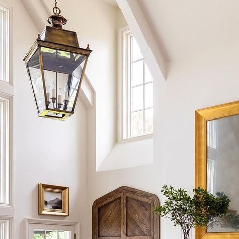 Kathy Kuo Home on Instagram: "When you have sky-high ceilings, a working fireplace, and a wall of windows to let natural light shine in, interior design seems to always fall into place beautifully! The subtle French Country-inspired pieces in this space feel oh-so-cozy to me, but they also let the breathtaking structure of this room to shine on its own. Design by: @establishdesign Styling by: @jbheditorial Home: @millcreek.manor Photography by: @lindsay_salazar_photography . . . #HighCeilings Millcreek Manor, English Country Design, Details Photography, English Country Style, French Magazine, Foyer Design, Photography Styling, Country French, English Country House