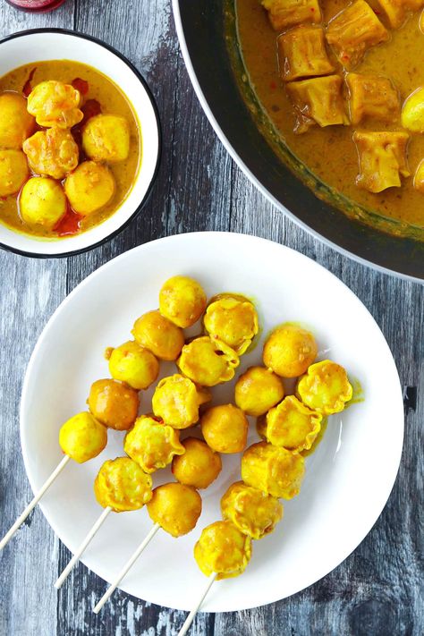 Hong Kong Curry Fish Balls is a classic street food snack that boasts a delicious, spicy and fragrant curry sauce! It's easy to make, and can be enjoyed street food style on wooden skewers, in a bowl drizzled with plenty of chili oil, or over steamed rice or noodles! #thatspicychick #curryfishballs #hongkongcurryfishballs #cantonesefood #appetizer #snack #streetfood #hongkongfood #easyrecipes | That Spicy Chick Curry Fish Balls, Curry Fish, Fish Balls, Wooden Skewers, Cantonese Food, Hong Kong Food, Fish Ball, Food Snack, Food Style