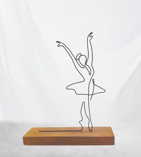 Ballerina Wire Art Sculpture tabletop decor. Hand-shaped from single steel wire, sitting on a solid fir tree coaster. The wire is colored with matte black acrylic paint, and the coaster is colored with an eco-friendly teak tree wood protector. Ballerina Drawing, Minimal Home Decor, Drawing Female, Drawing Female Body, Wire Wall Art, Diy Plaster, Wire Art Sculpture, Black Acrylic Paint, Kids Art Class