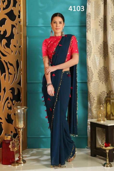 Teal Saree With Contrast Blouse, Teal Blue Saree, Trendy Saree, Party Wear Sarees Online, Pure Georgette Sarees, Teal Blue Color, Blue Saree, Trendy Sarees, Pink Tassel