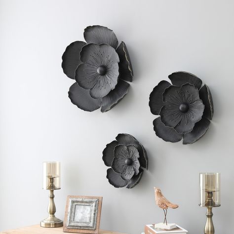 PRICES MAY VARY. Modern Design --This floral metal wall decor features three poppy-inspired flowers in a matte black finish for a contemporary flair. Handcrafted metal wall decoration has a black finish with gold accents. The 3D design features two layers of curved petals and tangible stamens to create a textural display on your walls. Easy to Hang -Wall decoration set arrives ready to mount with metal bracket attached on the back and mounting hardware included. Lightweight metal wall sculpture. Metal Wall Flowers, Metal Flower Wall Decor, Flowers Wall Decor, Botanical Wall Decor, Geometric Wall Decor, Metal Wall Sculpture, Metal Wall Hangings, Flowers Wall, Wall Decor Set