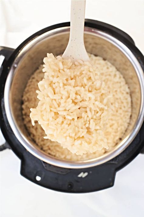 How to cook Arborio rice in Instant Pot, on the stove or in a slow cooker is here. Fluffy white rice cooked 3 different ways as a side dish. Instant Pot Arborio Rice, Arborio Rice Instant Pot, How To Cook Arborio Rice, Arborio Rice Recipes, Rice In Instant Pot, Fluffy White Rice, Rice In The Microwave, Rice On The Stove, Easy Pressure Cooker Recipes