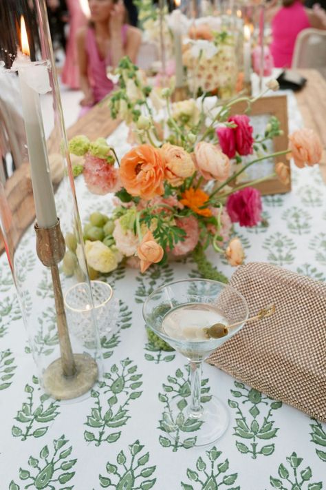 Colorful floral arrangements and chic cocktails on a patterned tablecloth, setting a lively wedding vibe. Pattern Table Cloth Wedding, Patterned Tablecloth Wedding, Peru Wedding, Indian Wedding Aesthetic, Patterned Tablecloth, Bridal Styled Shoot, Vibrant Wedding, Charleston Sc Wedding, Eclectic Wedding