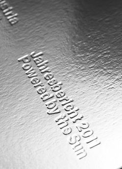 Close-up, Solar Annual Report by Mathias Nosel Embossing Packaging Design, Silver Foil Print Design, Silver Graphic Design, Metallic Packaging, Silver Foil Print, Foil Embossing, Embossed Text, Silver Foil Printing, Foil Packaging