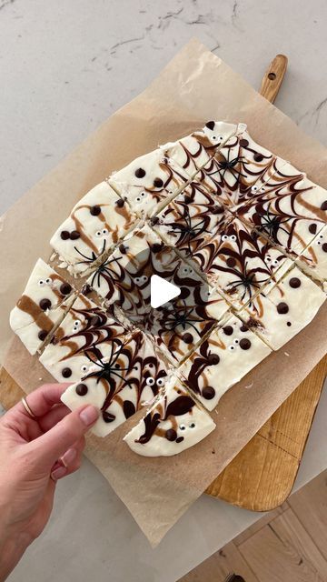 Kasey Dixon on Instagram: "EATS \ Halloween yogurt spider bark for a healthier version this season!🕸️🕷️👻 Make it extra spoooooooky by creating spider webs with dark chocolate!!🍫🕸️ See how I do it on this vid! My kiddos and Luke looooove it🖤 Comment RECIPE to get the details sent to your DMs!👩🏻‍🍳

#halloweentreats #halloweenrecipes #halloweenparty #halloweenfood #halloweenlover #halloweendecorating 

https://liketk.it/4TNs9" Marshmallow Spider Web, Halloween Bark, Yogurt Bark, Halloween Dessert, Spider Webs, Halloween Desserts, Mini Marshmallows, Halloween Recipes, Halloween Treats