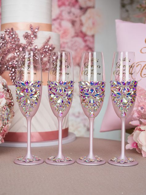 Make Your Quinceañera Celebration unique with Pink Iridescent Champagne Bottle and 4 Glasses Set - Ready to Be Filled with Joy, Best Quince Memories, and New Beginnings! Raise a toast to your journey to adulthood with a beautifully personalized Champagne Bottle and 4 Glasses, customized just for You. Set includes:~ bottle (empty) ~ 4 glasses.All the items are hand-made.Can be personalized with name and date of your celebration.We can decorate this set with any color or text you want. Quinceanera Glasses, Quince Glasses, Quince Cups, Quinceanera Champagne Glasses, Quinceanera Champagne, Bedazzled Bottles, Royalty Theme, Bedazzled Bottle, Money Card Box