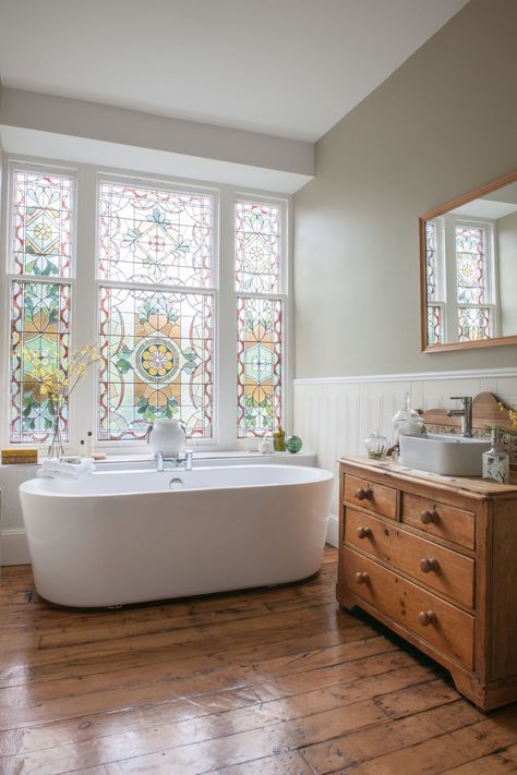 A striking restored Victorian stained glass window in a bathroom renovation. #periodliving #periodhomes #traditionalbathroomideas #traditionalbathroom #freestandingbathtub #stainedglasswindow Victorian Bath, Lead Glass, Decor Baie, Wooden Floors, Bathroom Windows, Design Del Prodotto, Bathtubs, Traditional Bathroom, Decor Minimalist