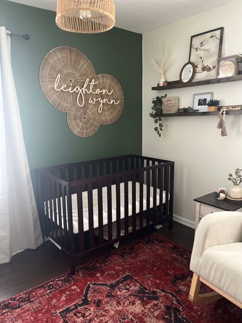 Dark Wood Boho Nursery, Gender Neutral Nursery With Dark Wood Crib, Dark Green And Beige Nursery, Green Nursery With Dark Furniture, Green And Dark Wood Nursery, Dark Green Baby Girl Nursery, Dark Floor Nursery, Forest Green Accent Wall Nursery, Dark Green Toddler Room