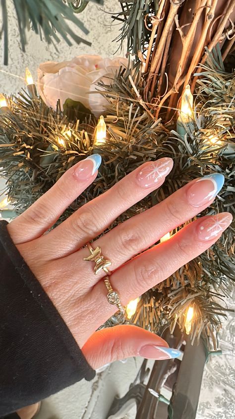 Almond French tip nails blue nails snowflake design acrylic nails Christmas winter Snowflake Nails Acrylic Almond, Winter Christmas Nails French Tip, Basic Almond Christmas Nails, Oval Shaped Nails Designs Christmas, Christmas Nails Almond Snowflake, Simple Winter French Tip Nails, Winter Nails Blue Almond, Cute Christmas Nails Acrylic Almond, French Tip Nails For Winter