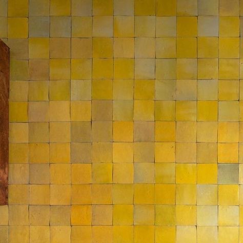 8  H O L L A N D  S T R E E T on Instagram: "A bathroom in a family home in north London, designed by @retrouvius, with zellige tiles on the wall and cabinets clad in leather reclaimed from shelves in the British Library. ⁠ Photographed by @paulraeside" Zellige Tiles, London Townhouse, Yellow Tile, Shelter Island, Zellige Tile, Yellow Bathrooms, The British Library, Tile Installation, British Library