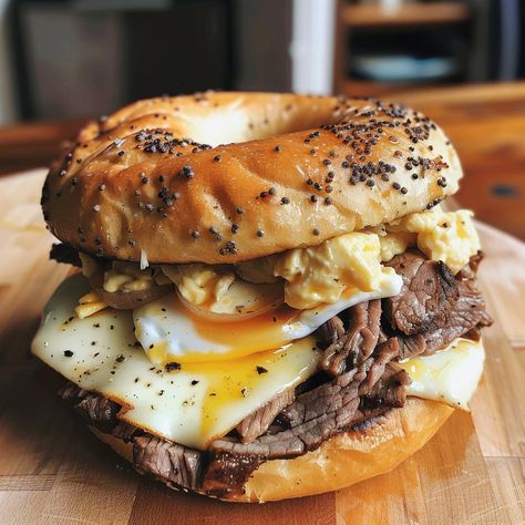 🥯🍳 Enjoy the morning with Copycat McDonald's Steak Egg and Cheese Bagel! Savory, hearty, and oh-so-satisfying. #BreakfastGoals #SteakEggCheese Copycat McDonald's Steak Egg and Cheese Bagel Recipe 🌟 Ingredients: For the steak patty: 250g shaved steak 1 onion, sliced (about 100g) 10ml Worcestershire sauce 5ml soy sauce Salt and pepper to taste For the eggs: 2 eggs, scrambled 15ml milk Salt and pepper to taste For the sandwich: 2 bagels 4 slices American cheese 30g butter 30ml mayonnaise 10ml... Steak And Scrambled Eggs Breakfast, Mcdonald's Steak Egg And Cheese Bagel, Steak Egg And Cheese Bagel, Cheese Bagel Recipe, Egg And Cheese Bagel, Shaved Steak, Breakfast Eggs Scrambled, Steak Breakfast, Eggs Scrambled