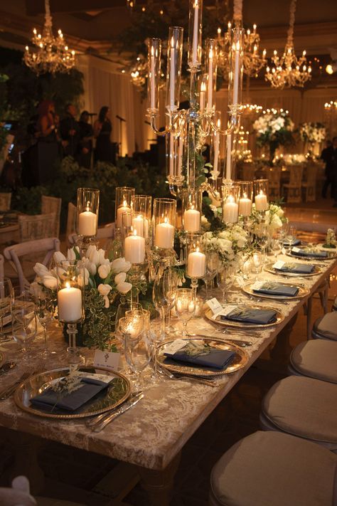 Candelabra and pillar candles on crystal stands filled the table along with tulips. Wedding Ideas Gold Elegant, Wedding At Garden, Elegant Gold Wedding Decor, Wedding By Candlelight, Southern Wedding Tablescape, Dream Wedding Inspiration, White Neutral Wedding Decor, Historic Ballroom Wedding Reception, Ballroom Theme Wedding