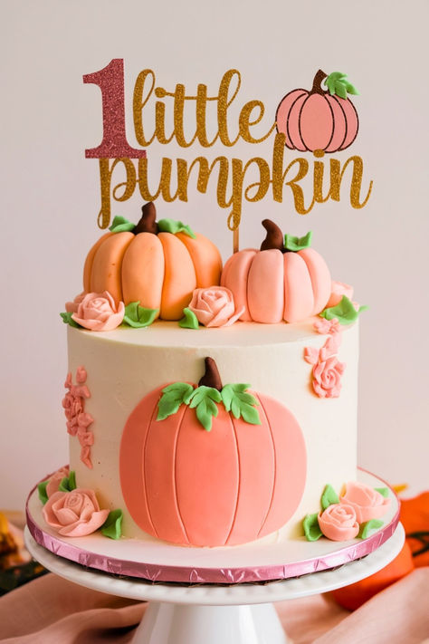 This image features a charming "Little Pumpkin First Birthday Cake" with pink and peach pumpkins, perfect for a fall-themed celebration. The gold glitter "1 Little Pumpkin" topper adds a cute touch, ideal for an "Our Pumpkin is Turning One" party. This cake is perfect for a "Pumpkin Theme Smash Cake" and fits beautifully with first birthday fall ideas. November First Birthday Theme Girl, Pumpkin Baby Shower Cake Girl, One Little Pumpkin Birthday Girl, Our Pumpkin Is Turning One Party Girl, September 1st Birthday Girl, October 1st Birthday Girl, Fall 1st Birthday Girl Themes, Pumpkin 1st Birthday Cake, Fall First Birthday Girl