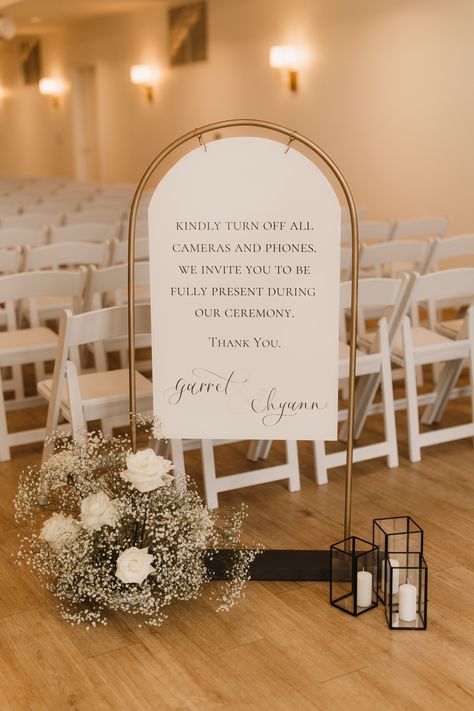 Arched sign and sign holder adding the perfect modern touch to your unplugged sign. Wedding Welcome Signs Arch, Table Sign Holders, Timeless Wedding Signage, Classy Wedding Signage, Wedding Ceremony Signage, Sign In Table For Wedding, Ceremony Welcome Table, Welcome Wedding Table, Signing Table Wedding Ceremony