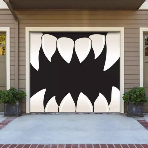 Every year, we pull out the hoard of Halloween décor we store in the garage and spend days putting it all up. But one thing we never tried before was decorating our front door! These awesome Halloween monster door ideas gave me all kinds of ideas, so if you’re looking for easy and creative ways to spookify your front door this year, check out this list and learn how to make your own monster door! #halloweendecor #DIYhalloweenDoor Halloween Monster Doors, Garage Halloween, Scary Teeth, Monster Teeth, Monster Door, Halloween Garage Door, Double Garage Door, Halloween Garage, Single Garage Door