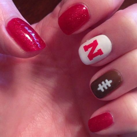 Nebraska Huskers football nails Husker Nails Nebraska, Husker Football Nails, Nebraska Football Nails, Nebraska Nails Designs, Nebraska Husker Nails, Red Football Nails, Nebraska Nails, Husker Nails, Anytime Nails