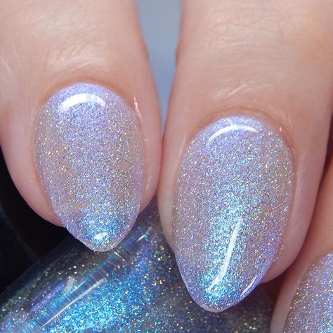 This one is a teal/blue shimmer polish that also has silver reflective glitters that become incredibly flashy when under bright lights. The micro ultra holographic glitters add an extra pop of sparkles. Glitter Whisperer and Quick Dry Top Coat are recommended to help the shimmers shine and the glitters sparkle! Name: Choose Happiness Type: Shimmer, Reflective Glitter # Recommended Coats: 2-3 Sizes Available: 15ml Shimmery Light Blue Nails, Blue Sparkly Winter Nails, Light Blue Nails With Sparkle, Blue Nail With Glitter, Shimmer Nail Ideas, Blue Pearlescent Nails, Silvery Blue Nails, Light Glitter Nails, Cute Short Natural Nails