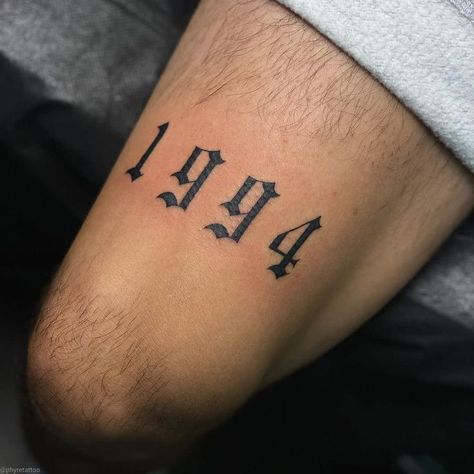 Roman Numeral Knee Tattoo, Date Above Knee Tattoo, Roman Numeral Tattoo Men Thigh, Year Above Knee Tattoo, Tattoo Ideas For Men Knee, Birth Year Tattoo Men, Over Knee Tattoo Men, Roman Numeral Tattoo Men, Above The Knee Tattoo Men