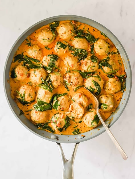 Chicken meatballs in Tuscan sauce with spinach. Delish Tuscan Chicken Meatballs With Gnocchi, Chicken Meatballs With Gnocchi, Chicken Meatball Gnocchi, Chicken Meatballs And Gnocchi, Tuscan Meatballs And Gnocchi, Slow Cooker Tuscan Meatballs With Gnocchi, Chicken Meatballs Pasta, Chicken Meatballs And Sauce, Tuscan Turkey Meatballs