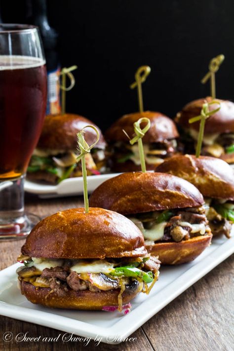 Messy little Philly cheese steak sliders are irresistibly cheesy and flavorful, perfect for your game day menu! Gourmet Sliders, Cheese Steak Sliders, Steak Sliders, Cheesesteak Sliders, Philly Cheese Steak Sliders, Cheese Steak, Philly Cheese, Philly Cheesesteak, Slider Recipes