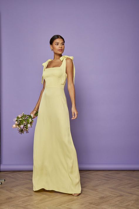 Looking for the perfect bridesmaid dress? Find stunning, elegant bridesmaid dresses in your ideal colour & style, and buy bridesmaid dresses online today Non Satin Bridesmaid Dresses, Pastel Yellow Bridesmaid Dress, Satin Off The Shoulder Dress, Bridesmaid Dresses Summer, Lemon Bridesmaid Dresses, Neutral Color Dresses, Pale Yellow Dress, Yellow Satin Dress, Tie Shoulder Dress