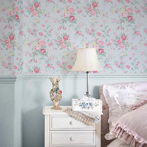 Wildflower wallpaper design features an enchanting garden floral scene inspired by an antique chintz fabric remnant from the Shabby Chic by Rachel Ashwell archive. A majestic display of traditional English wildflowers and roses creates an alluring and timeless print with an authentic vintage feel. The understated pale blue background highlights the blossoms' details and hues making it a captivating addition to any country cottage or classic interior. First introduced to the Shabby Chic collectio Floral Room Wallpaper, Flower Blue Wallpaper, English Wildflowers, English Country Decor Bedroom, Wildflower Wallpaper, Sage Background, Off White Wallpapers, Shabby Chic Wallpaper, Blue Shabby Chic