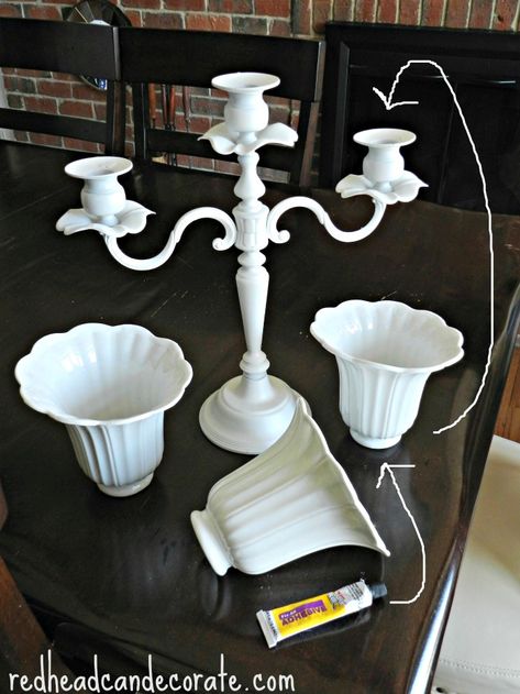 DIY Candelabra Flower Planter with Upcycled Ceiling Fan Shades | Redhead Can DecorateRedhead Can Decorate Diy Candelabra, Candelabra Flowers, Candelabra Wedding Centerpieces, Ceiling Fan Shades, Candelabra Wedding, Flower Planters, Clipboard, Glass Crafts, Glass Lighting